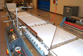 Wide Shrink Wrapper Metering Conveyor