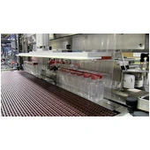 Máquina de empaquetado por retractilado de doble carril Arpac 708HB-32: proceso de producción