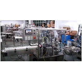 Ohlson Rotodex 9888 Bottle Filling and Capping System