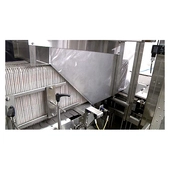 Polypack FIL Inline Total Closure Shrink Bundler Vertically Stacked Trays Entering Clear Film
